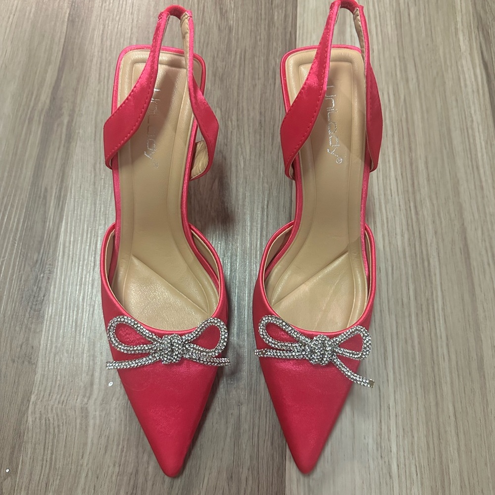 Pink sling back sparkly bow heels